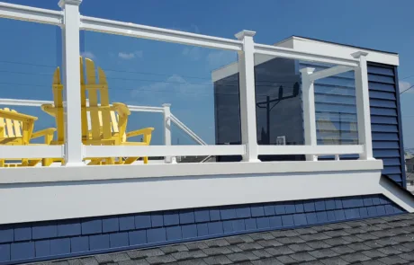 Glass Panels with PVC railings on a rooftop patio area.